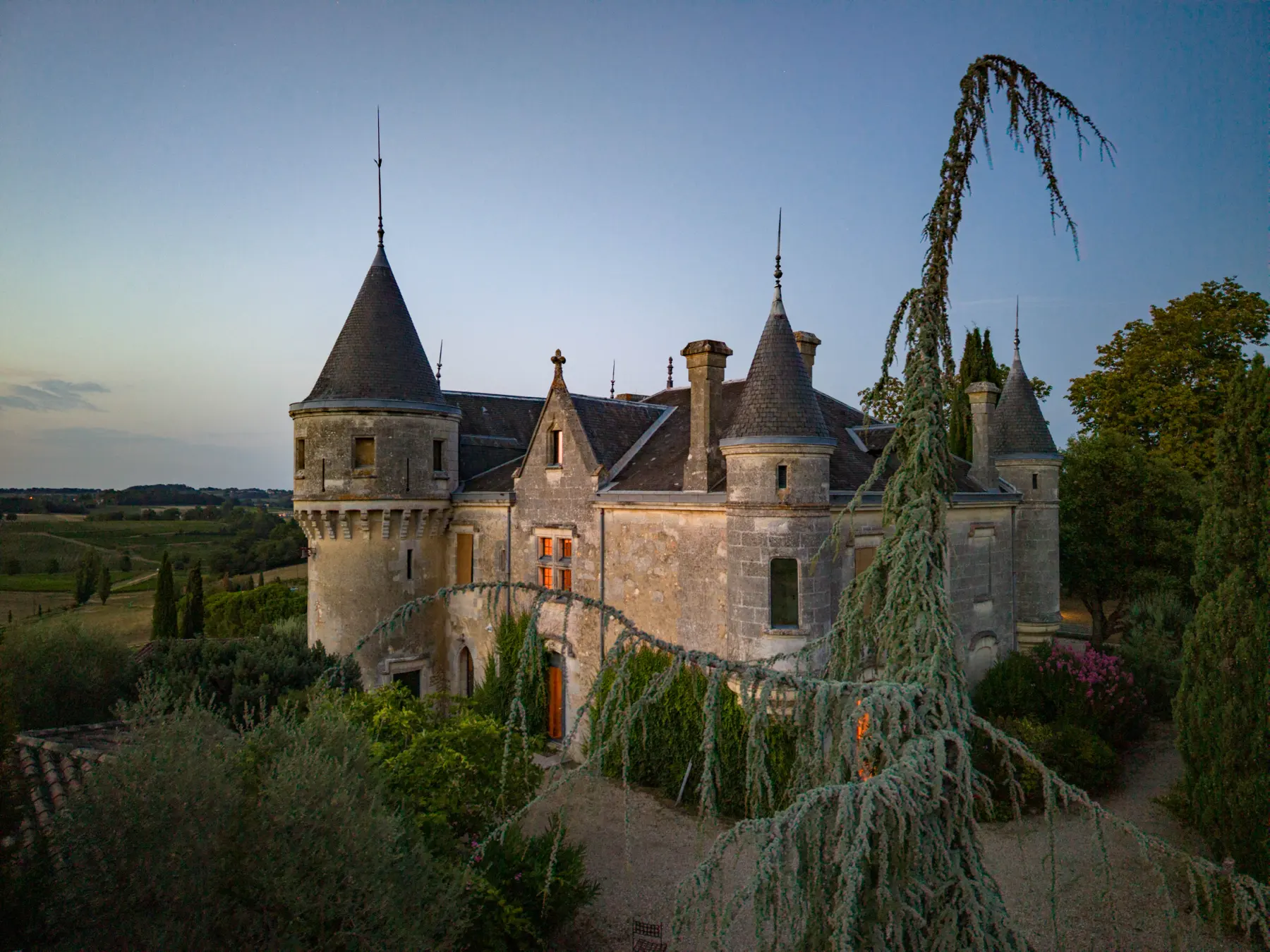 Château de la Grave seen from above at dusk
