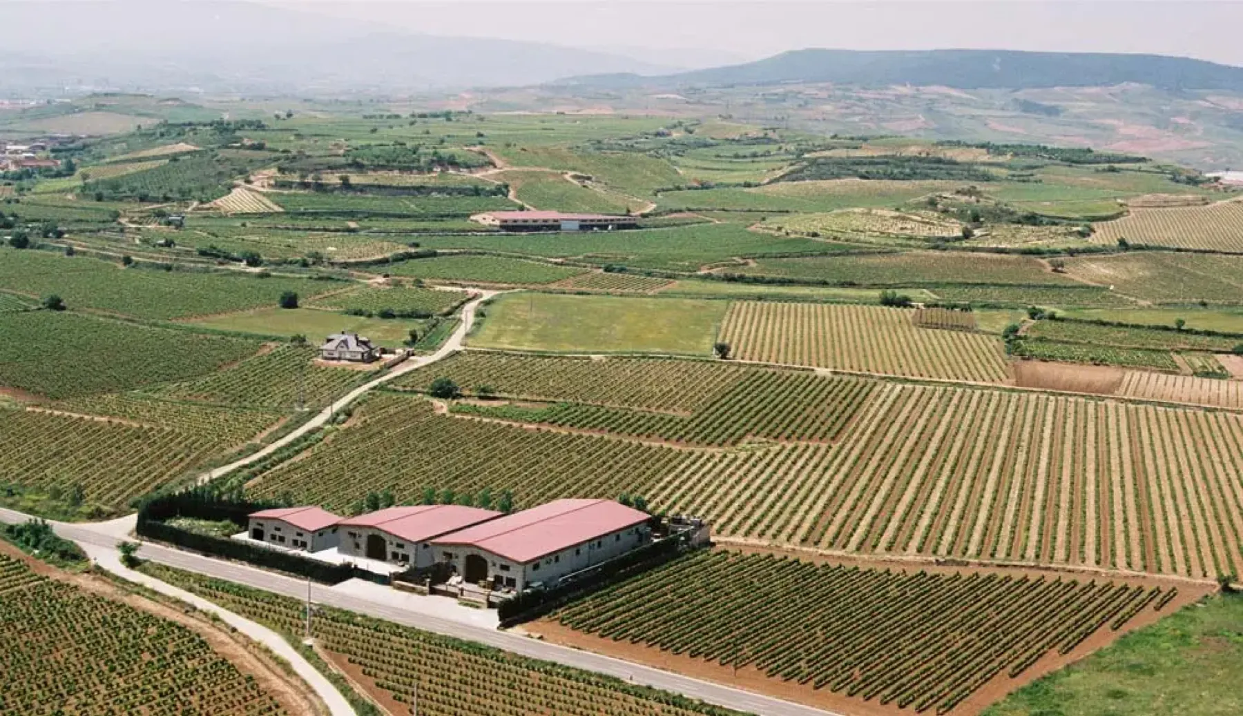 Aerial view of the Heras Cordón winery surrounded by vineyards